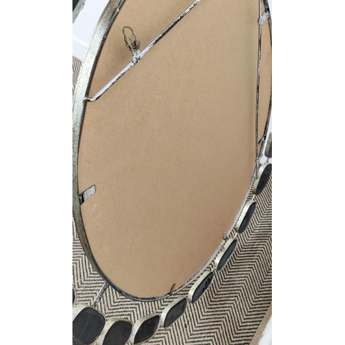 527 - OVAL WALL MIRROR, 122cm x 94cm, in a silvered metal frame with bevelled plate and a satellite border... 