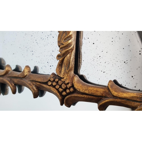 528 - WALL MIRROR, traditional style, gilt, oak leaf detail, 105cm x 157cm