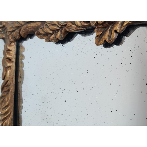 528 - WALL MIRROR, traditional style, gilt, oak leaf detail, 105cm x 157cm