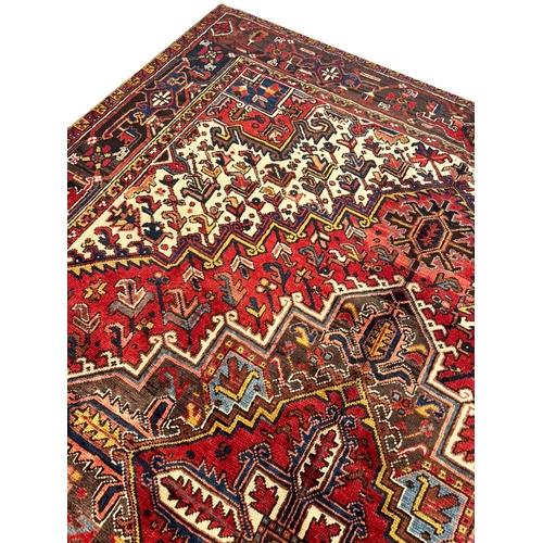 106 - VINTAGE PERSIAN HERIZ CARPET, 315cm x 243cm.