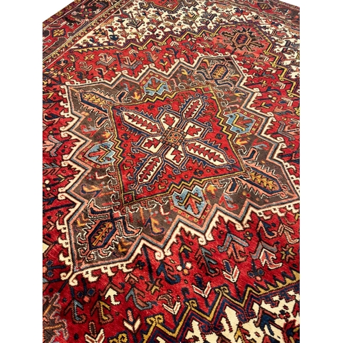 106 - VINTAGE PERSIAN HERIZ CARPET, 315cm x 243cm.