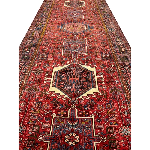 117 - ANTIQUE PERSIAN KARAJA KELLER CARPET, 442cm x 155cm.