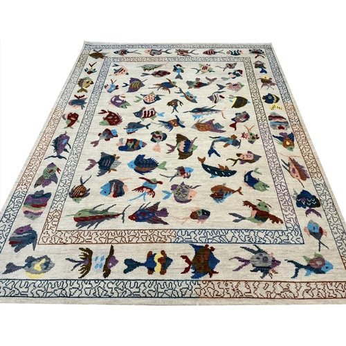 119 - CONTEMPORARY FISH DESIGN WOOL CARPET, 300cm x 202cm.