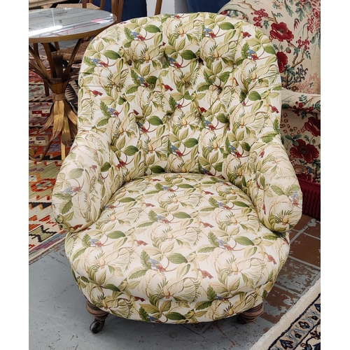 541 - ARMCHAIR, Victorian with deep buttoned botanical print upholstery and turned front supports.