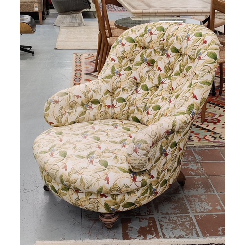 541 - ARMCHAIR, Victorian with deep buttoned botanical print upholstery and turned front supports.