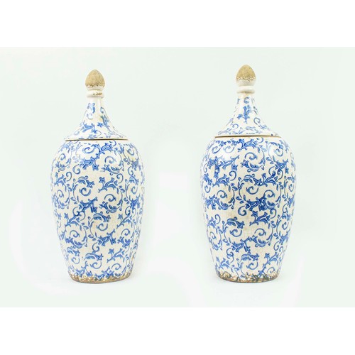 24 - A PAIR OF BLUE AND WHITE PORCELAIN CANISTERS, with lids each 45cm H. (2)