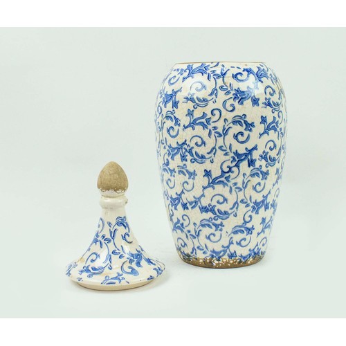 24 - A PAIR OF BLUE AND WHITE PORCELAIN CANISTERS, with lids each 45cm H. (2)