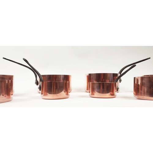 26 - BATTERIE DE CUISINE, two graduated sets of five, copper and iron. (10)