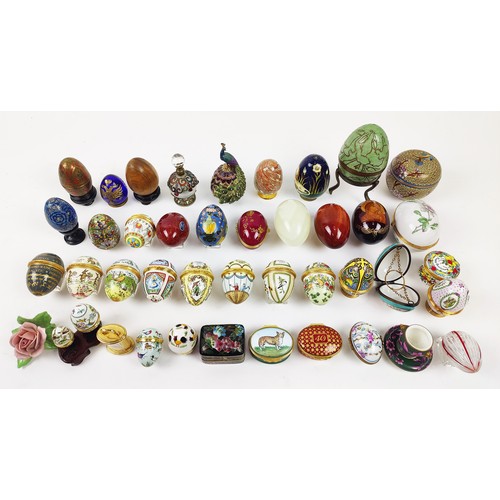 33 - A COLLECTION OF ENAMELLED EGG TRINKETS, mostly by Halcyon days enamels, plus various other boxes, eg... 