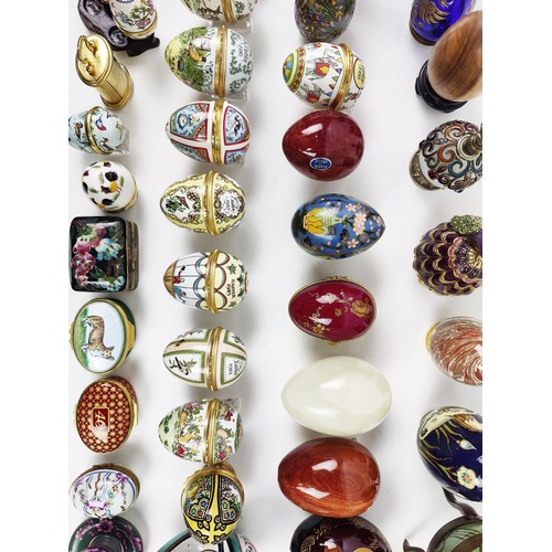 33 - A COLLECTION OF ENAMELLED EGG TRINKETS, mostly by Halcyon days enamels, plus various other boxes, eg... 