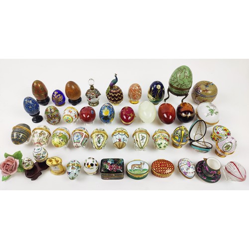 33 - A COLLECTION OF ENAMELLED EGG TRINKETS, mostly by Halcyon days enamels, plus various other boxes, eg... 