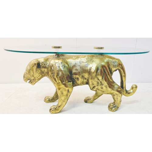 397 - COFFEE TABLE, gilt metal panther base with oval glass top, 45cm D x 96cm W x 66cm D.