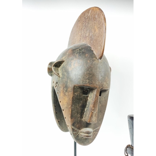 10 - A BOBO FING HELMET MASK- BURKINA FASO, along with a Kenyan beaded belt and pestle and mortar, mask 7... 