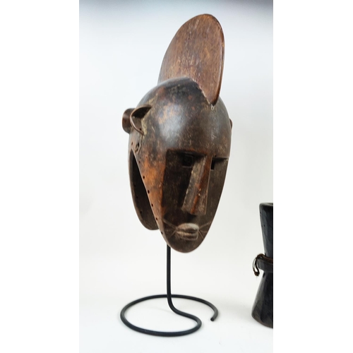 10 - A BOBO FING HELMET MASK- BURKINA FASO, along with a Kenyan beaded belt and pestle and mortar, mask 7... 