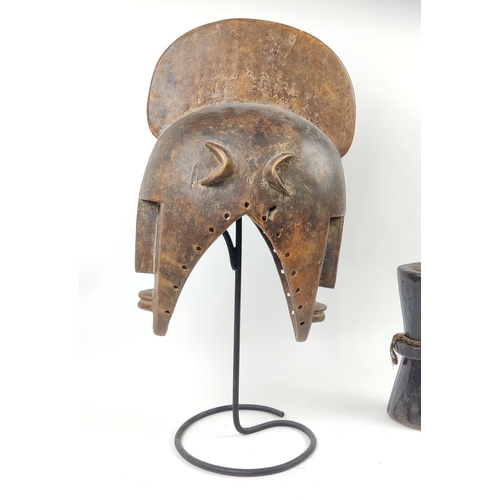 10 - A BOBO FING HELMET MASK- BURKINA FASO, along with a Kenyan beaded belt and pestle and mortar, mask 7... 