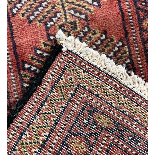 120 - BOKHARA CARPET, 34cm x 274cm.