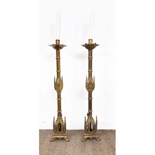 15 - CHURCH ALTAR CANDLESTICKS, a pair, Gothic style brass, 105cm H. (2)