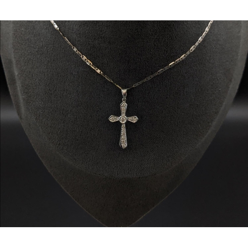 33 - AN 18CT WHITE GOLD DIAMOND SET CROSS PENDANT NECKLACE, the cross set with round brilliant cut diamon... 