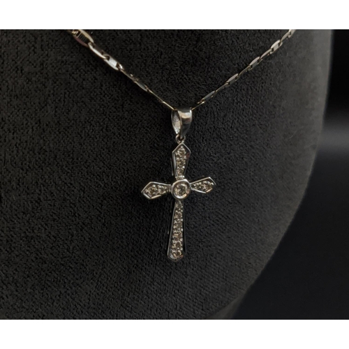 33 - AN 18CT WHITE GOLD DIAMOND SET CROSS PENDANT NECKLACE, the cross set with round brilliant cut diamon... 