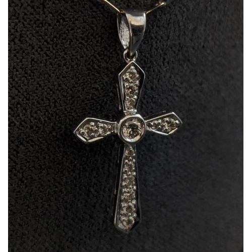 33 - AN 18CT WHITE GOLD DIAMOND SET CROSS PENDANT NECKLACE, the cross set with round brilliant cut diamon... 