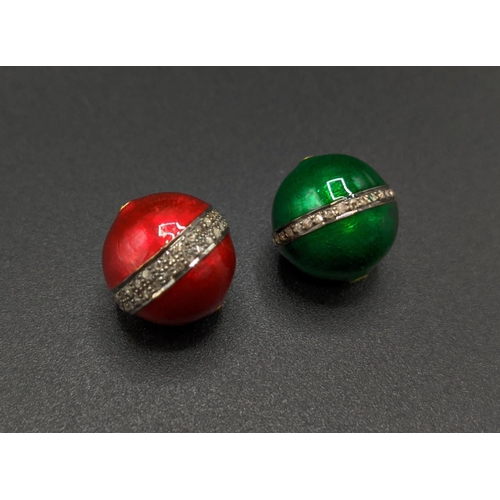 34 - A PAIR OF ENAMEL AND DIAMOND SET BEADS, in green and red, diamond set bands, 13mm diameter (2)