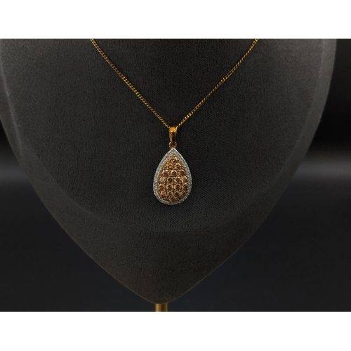 38 - AN 9CT YELLOW GOLD PEARL SHAPED PENDANT, set with a cluster of diamonds, with an approximate total c... 