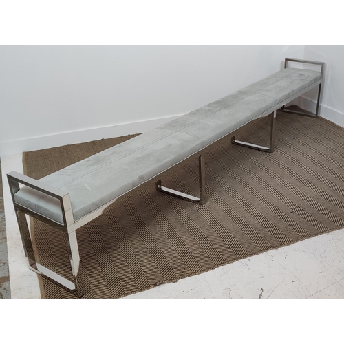 381 - LONG BENCH, with a metal frame and leather seat, 310cm L x 41cm x 57cm H.