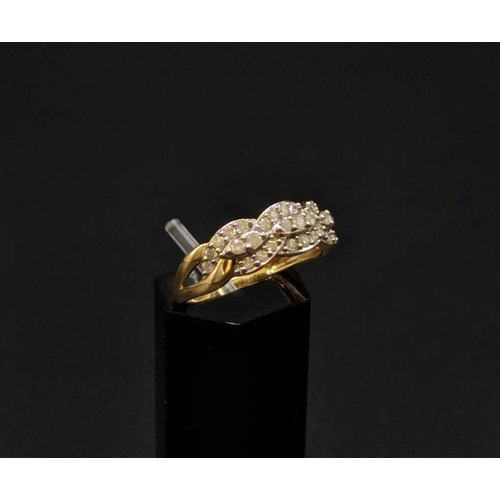 39 - A 9CT YELLOW GOLD DIAMOND SET DRESS RING, with intertwining bands set with round brilliant cut diamo... 