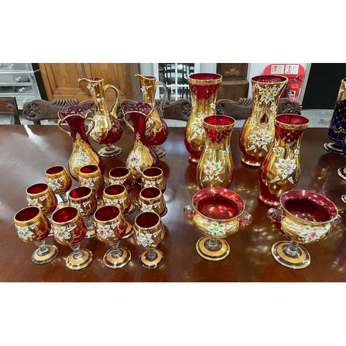 41 - VENETIAN MURANO TRE FUOCHI RUBY GLASS, comprising three pairs of vases, a pair of pitchers, a pair o... 