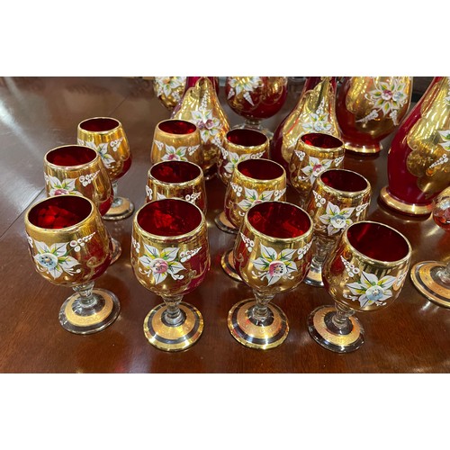 41 - VENETIAN MURANO TRE FUOCHI RUBY GLASS, comprising three pairs of vases, a pair of pitchers, a pair o... 