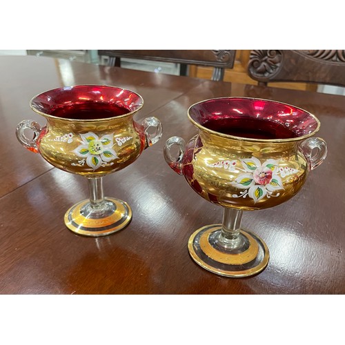 41 - VENETIAN MURANO TRE FUOCHI RUBY GLASS, comprising three pairs of vases, a pair of pitchers, a pair o... 