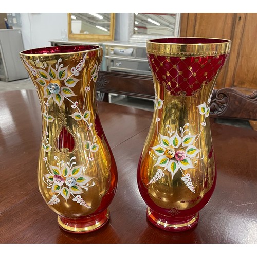 41 - VENETIAN MURANO TRE FUOCHI RUBY GLASS, comprising three pairs of vases, a pair of pitchers, a pair o... 