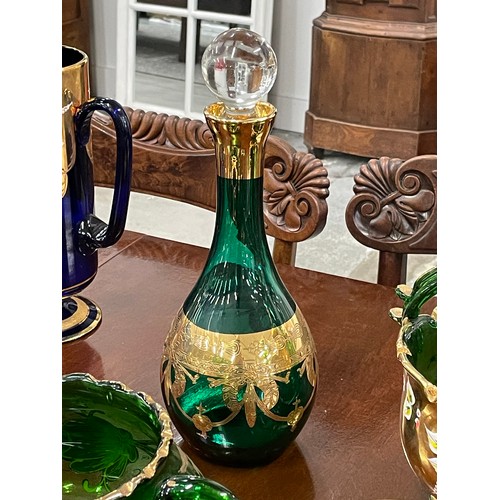 43 - VENETIAN MURANO TRE FUOCHI GREEN GLASS, comprising a candlestick, decanter with stopper, a basket, h... 