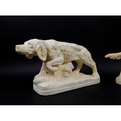 44 - TWO DOG FIGURES, plaster, one depicting a labrador and the other of a golden retriever,, largest6 27... 