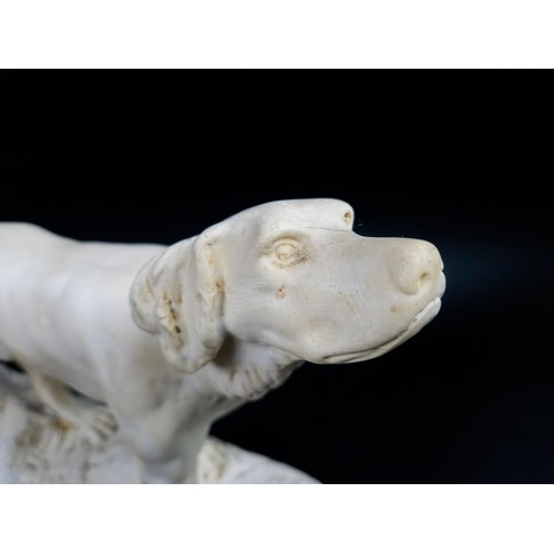 44 - TWO DOG FIGURES, plaster, one depicting a labrador and the other of a golden retriever,, largest6 27... 