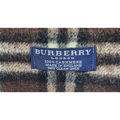 22 - BURBERRY CASHMERE SCARF, in check pattern together with a Paul Smith and a Nordstrom cashmere scarve... 