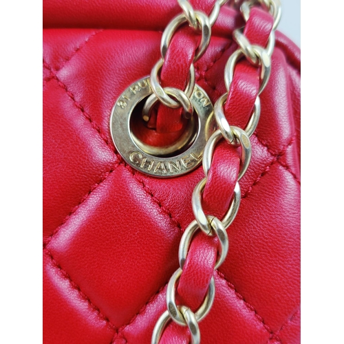 28 - CHANEL HANDBAG, red leather body with matching satin lining, top zippered closure, rear slip pocket ... 