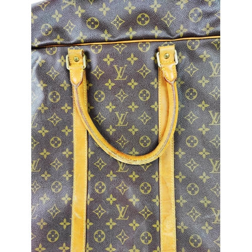 3 - LOUIS VUITTON SUITCASE SIRIUS 70, monogram canvas with leather trims and double top handles, brass h... 