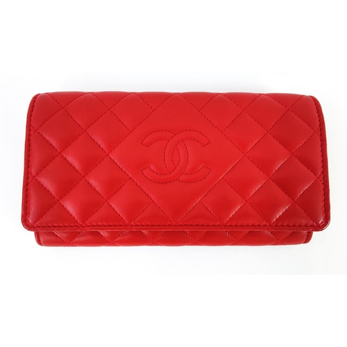 30 - CHANEL WALLET, front flap closure with embossed iconic logo, one zippered compartment and card slots... 