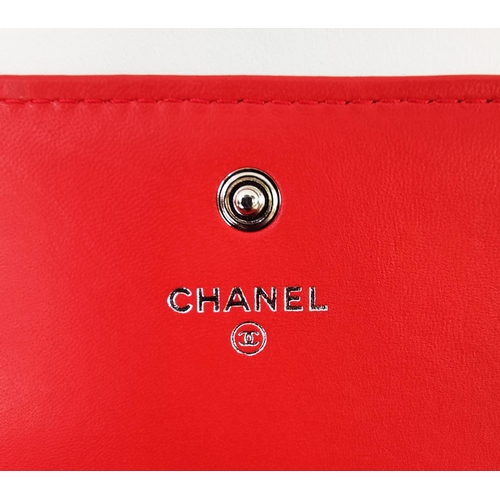 30 - CHANEL WALLET, front flap closure with embossed iconic logo, one zippered compartment and card slots... 