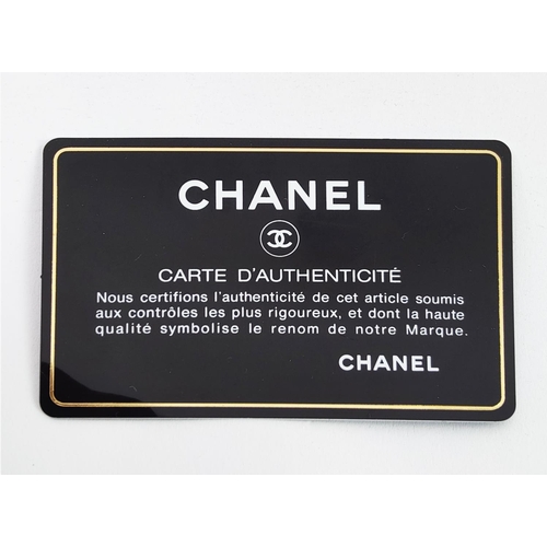 30 - CHANEL WALLET, front flap closure with embossed iconic logo, one zippered compartment and card slots... 