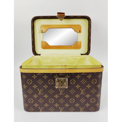 32 - LOUIS VUITTON VANITY CASE, hard sided monogram canvas with leather trim, 22cm H x 33cm x 23cm.