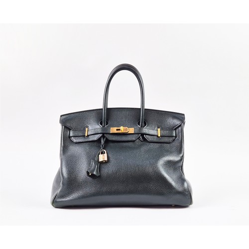 23A - HERMÈS BIRKIN 35 DARK GREEN, gold tone hardware, top handles, color matching leather lining, one zip... 