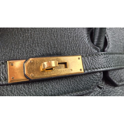 23A - HERMÈS BIRKIN 35 DARK GREEN, gold tone hardware, top handles, color matching leather lining, one zip... 