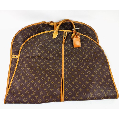 31 - LOUIS VUITTON HOLDALL, washbag and suit carrier. (3)