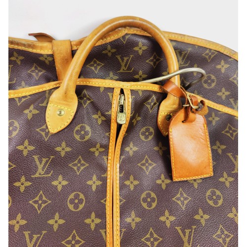 31 - LOUIS VUITTON HOLDALL, washbag and suit carrier. (3)