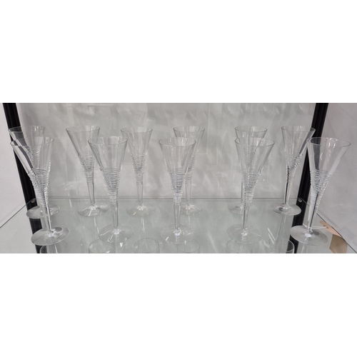 42 - JASPER CONRAN FOR STUART, DRINKING GLASSES, comprising eleven Champagne flutes, 26cm H, twelve white... 