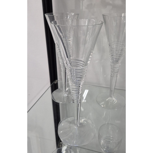 42 - JASPER CONRAN FOR STUART, DRINKING GLASSES, comprising eleven Champagne flutes, 26cm H, twelve white... 