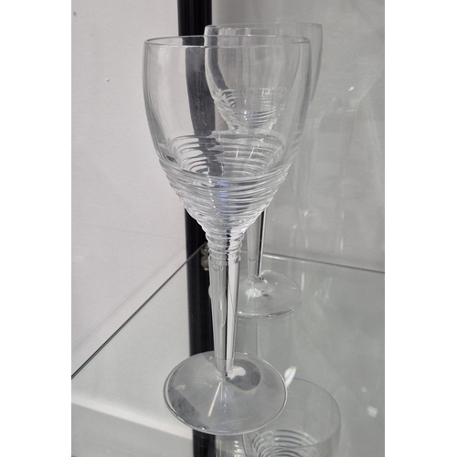 42 - JASPER CONRAN FOR STUART, DRINKING GLASSES, comprising eleven Champagne flutes, 26cm H, twelve white... 