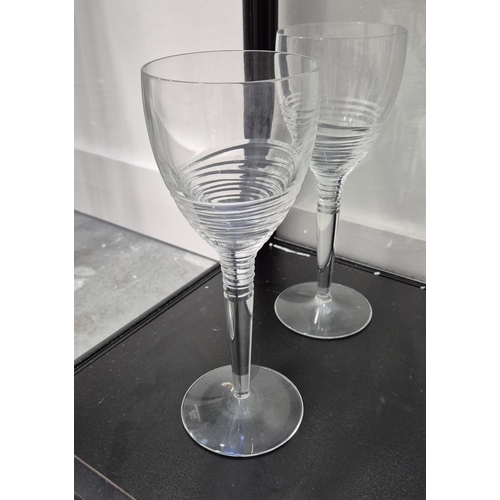 42 - JASPER CONRAN FOR STUART, DRINKING GLASSES, comprising eleven Champagne flutes, 26cm H, twelve white... 